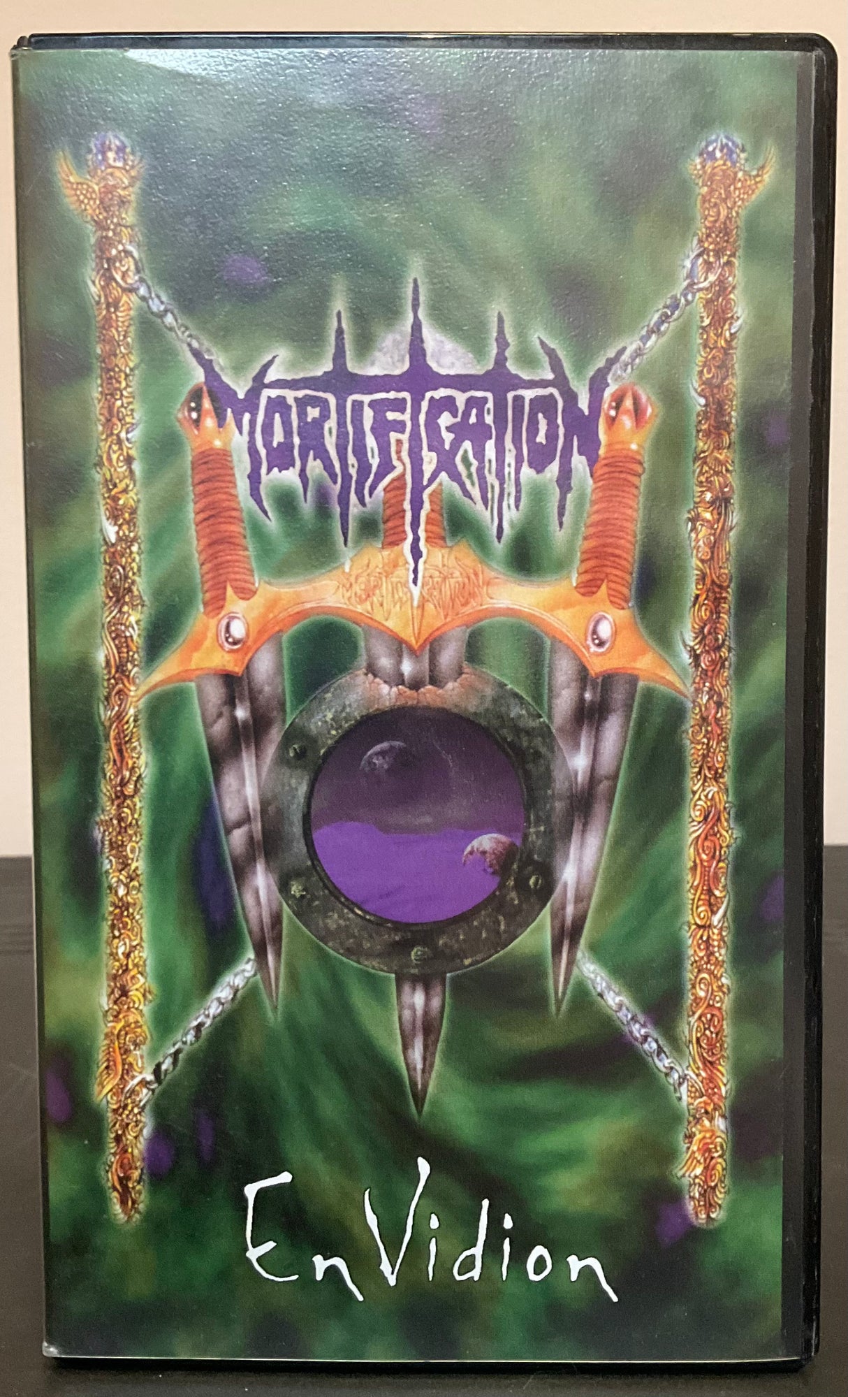 Mortification: EnVidion ClamshellvVHS