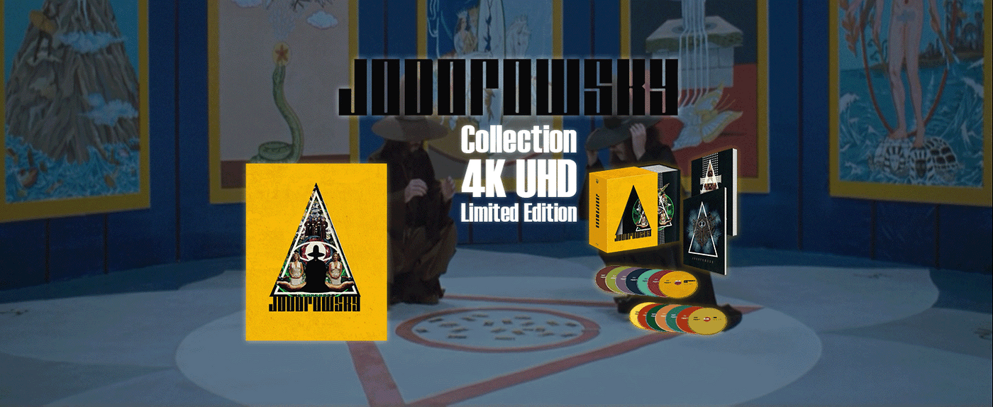Limited edition 4K UHD collection box set for the movie 'Alejandro Jordowsky' displayed in a stylized room scene. The set includes a yellow box with a black triangle logo, a black-and-white movie poster, a yellow slipcover with a black triangle logo, and several colorful vinyl discs.