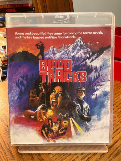 Blood Tracks w/SLIP USED