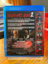 Never Hike Alone 2 (SIGNED) USED