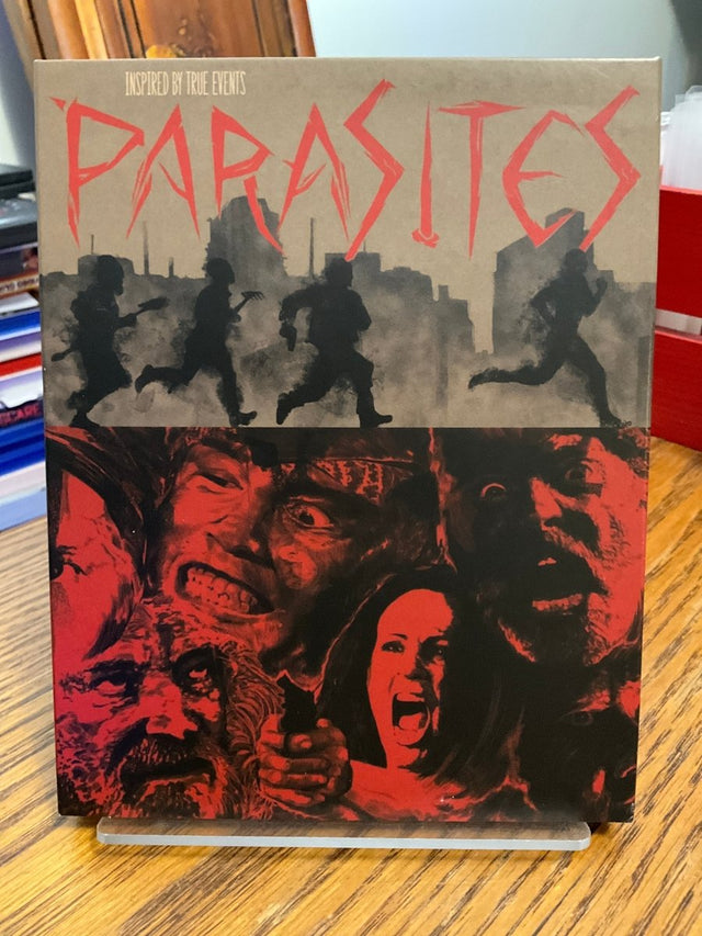Parasites W/SLIP USED