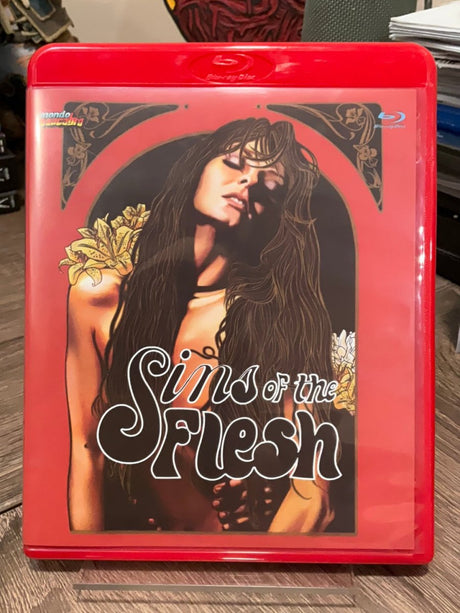 Sins of the Flesh Limited Edition (0272/1000) with booklet and postcards USED