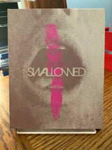 Swallowed w/SLIP AND BOOKLET USED *SEE NOTE*