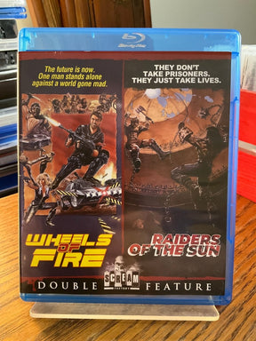 Wheels of Fire / Raiders of the Sun USED