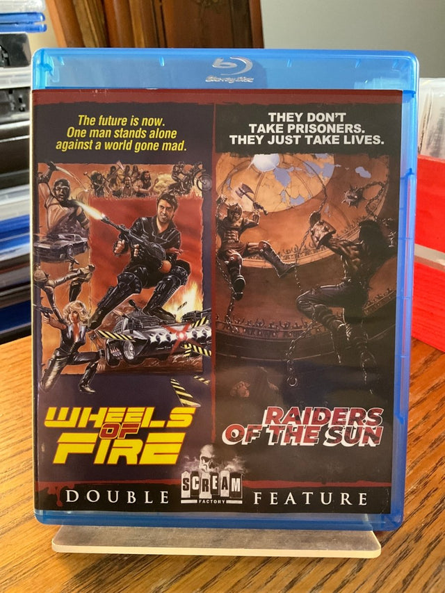 Wheels of Fire / Raiders of the Sun USED